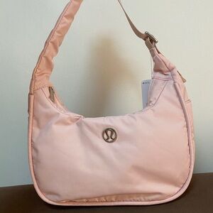 Baby pink lululemon shoulder bag